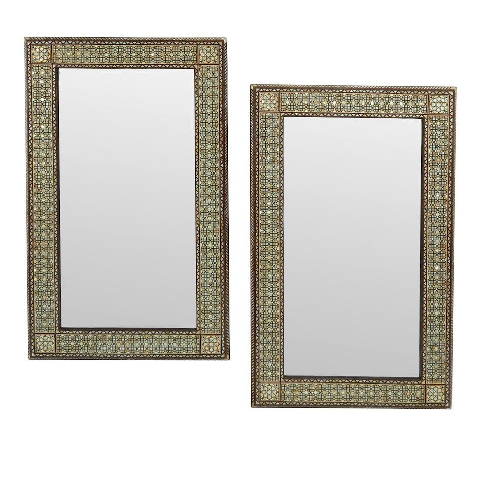 A PAIR OF LEVANTINE STYLE BONE AND SHELL INLAID MIRRORS: A PAIR OF LEVANTINE STYLE BONE AND SHELL INLAID MIRRORS height 59 1/2in (151cm); width 35 1/2in (90cm) This lot is subject to the following lot symbols: W W If the lot is not picked up immediately fol