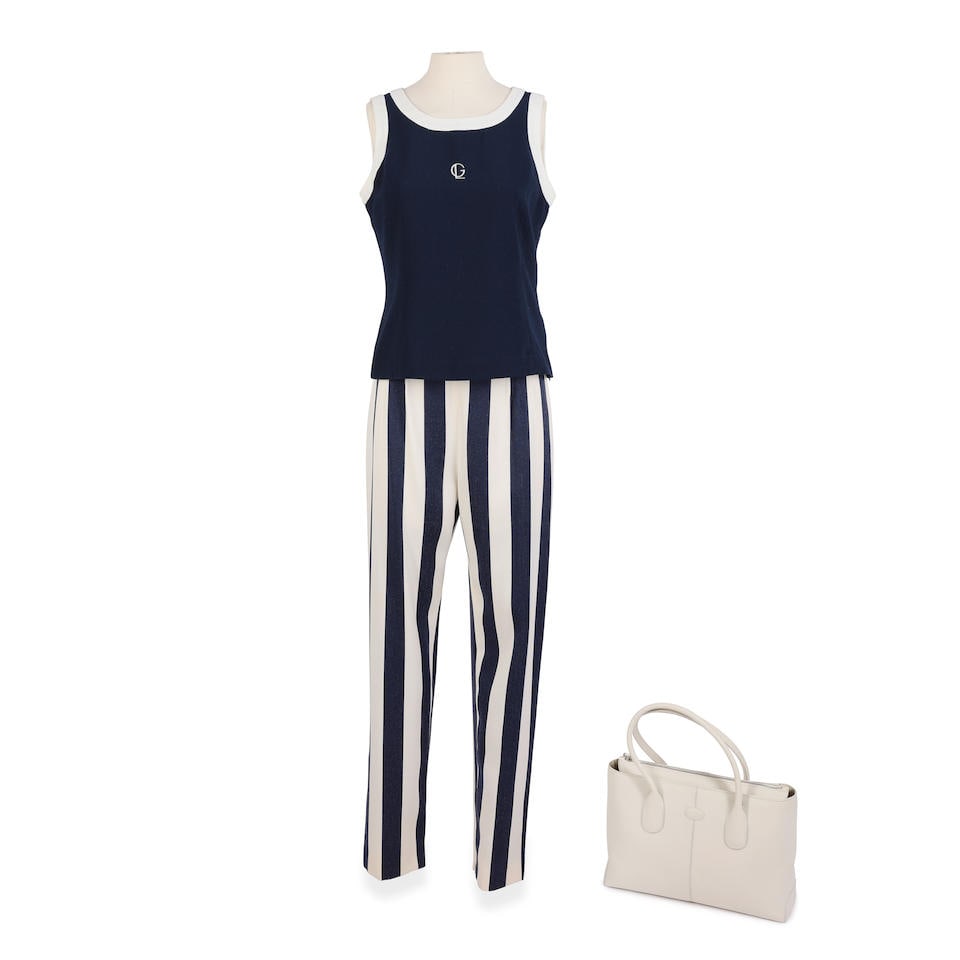 Elizabeth Debicki (as Princess Diana): A top and striped trousers ensemble Season 6, Episode 1, ...: Elizabeth Debicki (as Princess Diana): A top and striped trousers ensemble Season 6, Episode 1, 'Persona Non Grata' A navy and white top with 'GL' embroidered centre front by Guy Laroche, a pair of ve