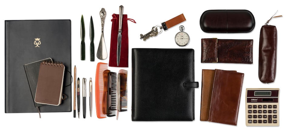 Matt Smith, Tobias Menzies & Jonathan Pryce (as Prince Philip): a large selection of character d...: Matt Smith, Tobias Menzies & Jonathan Pryce (as Prince Philip): a large selection of character desk and dressing table props used across seasons and actors To include: a navy blue A4 notebook, embosse