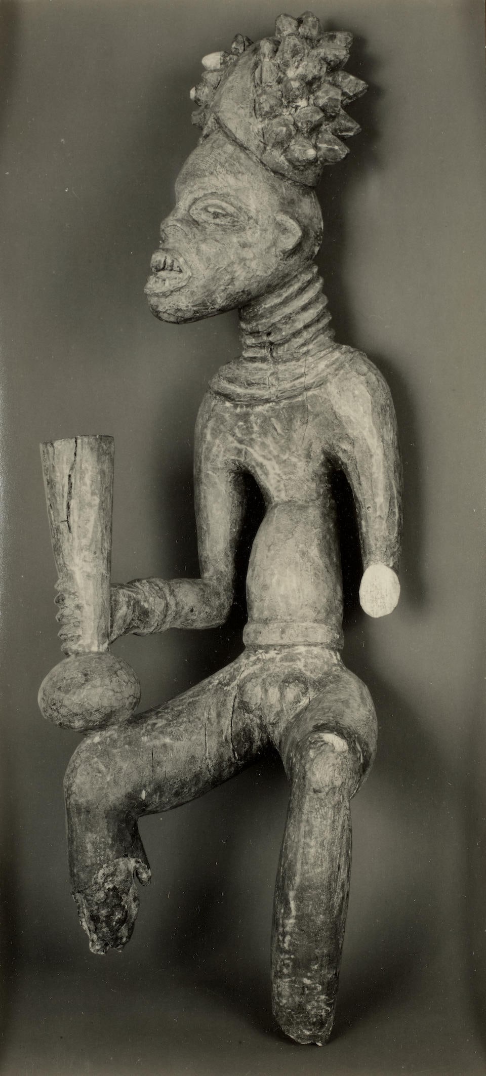 Walker Evans (1903-1975); Figure, Cameroon, Bango, Grassland (African Sculpture 313);: Walker Evans (1903-1975) Figure, Cameroon, Bango, Grassland (African Sculpture 313), 1935 Gelatin silver print; the Lunn Gallery stamp, with numbers 'XX' and '313' in pencil, on the reverse, framed. 9