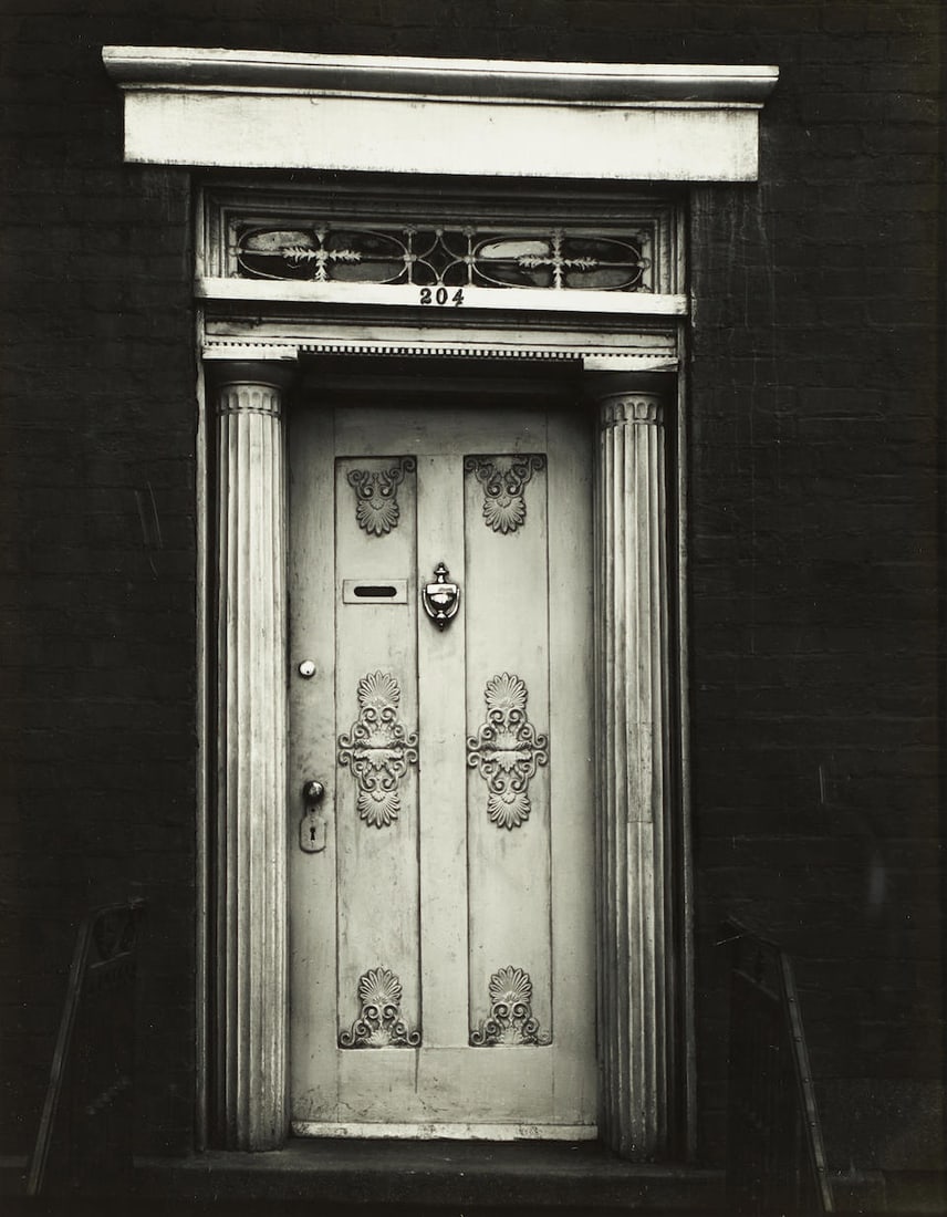 Walker Evans (1903-1975); Doorway, 204 West 13th Street, New York;: Walker Evans (1903-1975) Doorway, 204 West 13th Street, New York, 1931 Gelatin silver print, printed 1974; mounted, signed and editioned 'A/P' in pencil on the mount, framed; this work is an Artist's