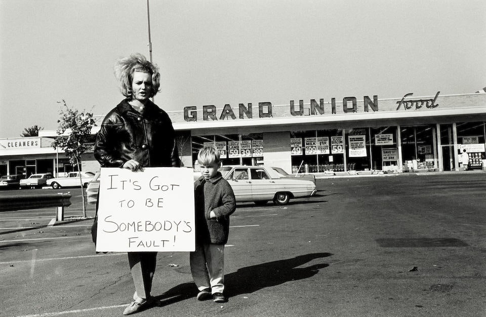 Steve Schapiro (1934-2022); 'Supermarket Picketers 'It's Got to Be Somebody's Fault,' New Jersey';: Steve Schapiro (1934-2022) 'Supermarket Picketers 'It's Got to Be Somebody's Fault,' New Jersey', 1963 Gelatin silver print, printed later; signed, titled, dated, and numbered '13/25' in pencil and th