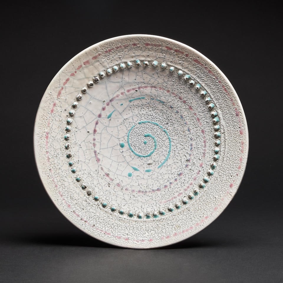 Jean Besnard (1889-1958) PlatCréation circa 1930/1932Signé incisé 'Jean Besnard F...: Jean Besnard (1889-1958) Plat Création circa 1930/1932 Signé incisé 'Jean Besnard France', en céramique émaillée H: 7cm.(2.76in.); D: 35cm.(13.78in.). A signed plate in e