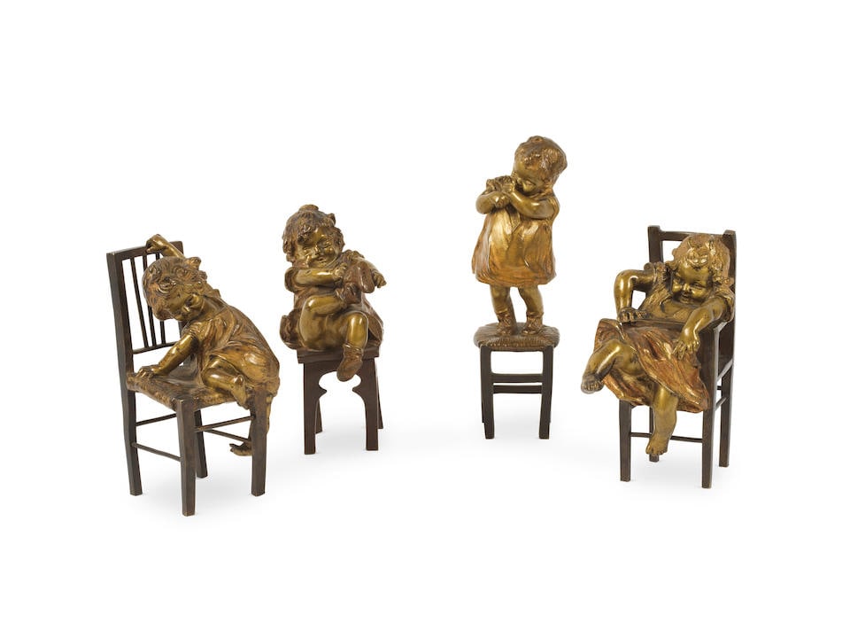 Juan Clara (d'après): Juan Clara (d'après) 'Fillettes sur des chaises' Quatre sculptures en bronze patiné et doré. H: 15cm pour la plus grande Four bronze figures of girls on chairs by Juan Clara. For furthe