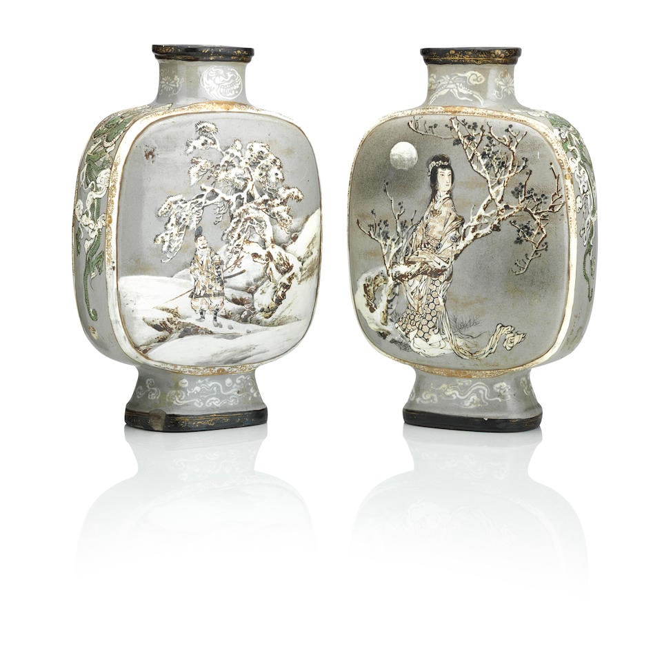A pair of Satsuma flasks Meiji: A pair of Satsuma flasks Meiji Of square flattened form, each painted to one side with a samurai and to the other with an immortal, the sides decorated dragons in clouds, 28.7cm high For further infor