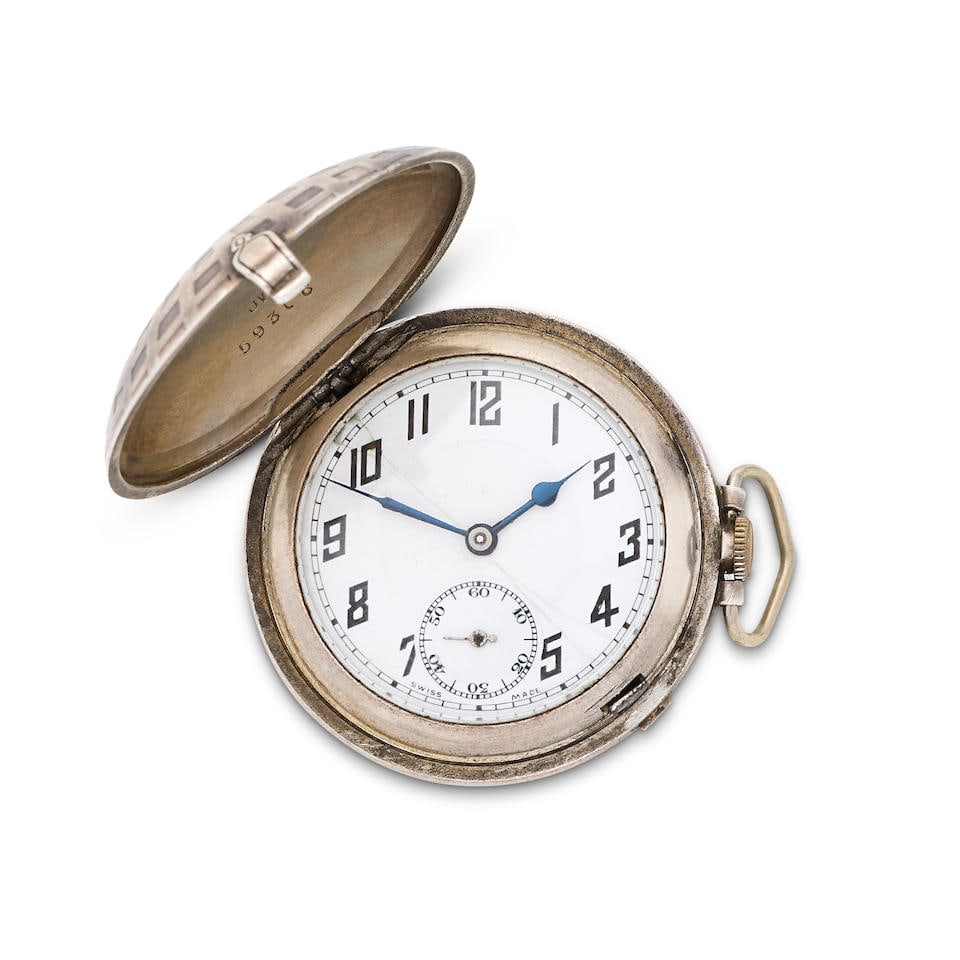 Talis Watch Co. A silver keyless wind full hunter pocket watch in the form of a golf ball Glasgo...: Talis Watch Co. A silver keyless wind full hunter pocket watch in the form of a golf ball Date: Glasgow Import mark for 1924 Movement: Swiss lever Dial: White Case: Polished golf ball pattern, No.593C