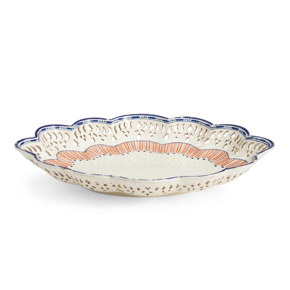 Enamel-painted Creamware Platter with Pierced Decoration, Josiah Wedgwood, Staffordshire, Englan...: Enamel-painted Creamware Platter with Pierced Decoration, Josiah Wedgwood, Staffordshire, England, late 18th century. Oblong shallow bowl with twelve-lobed shaped rim, the edge penciled in overglaze b