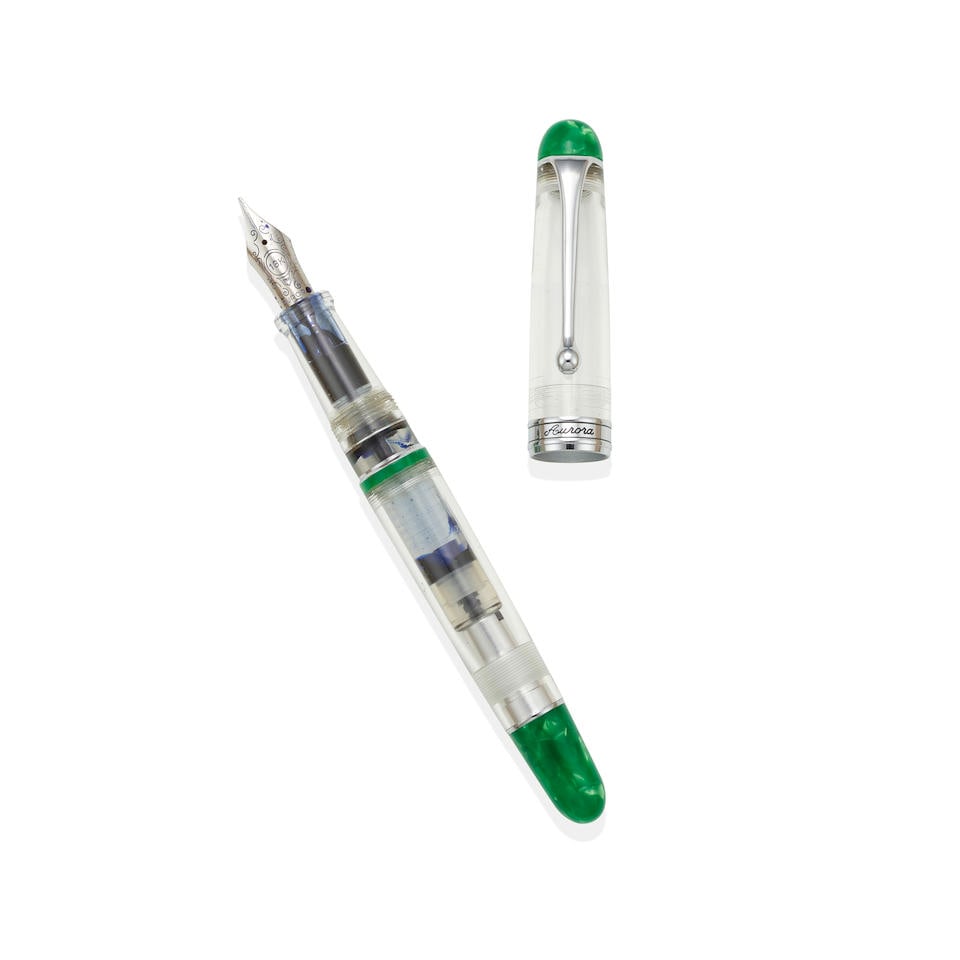 AURORA. A LIMITED EDITION RESIN FOUNTAIN PEN: AURORA. A LIMITED EDITION RESIN FOUNTAIN PEN Model: Demonstrator Minerali Date: Circa 2015, No. 12/388 Case: Transparent resin barrel and cap, ends with green marbled resin Accompaniments: Fitted box 