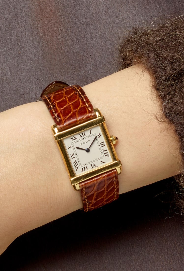CARTIER. AN 18K GOLD QUARTZ WRISTWATCH Chinoise, c. 1980s (1 of 2)