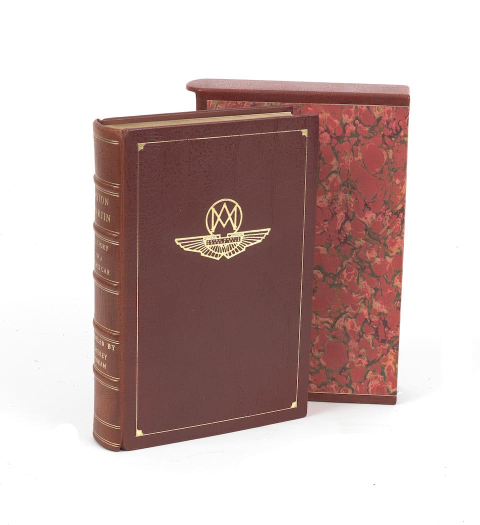 Dudley Coram: Aston Martin - The Story of a Sports Car; a signed leather-bound limited edition,: Dudley Coram: Aston Martin - The Story of a Sports Car; a signed leather-bound limited edition, limited edition numbered 38/500, 2004 re-publication by the Aston Martin Owner's Club, maroon leather ha