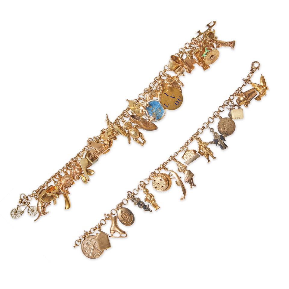 TWO 14K GOLD CHARM BRACELETS: TWO 14K GOLD CHARM BRACELETS Suspending mostly 14k gold charms, including American makers Sloan & Co, Eckfeldt & Ackley, Enos Richardson, and Tiffany & Co., with low karat gold and silver charms, weig