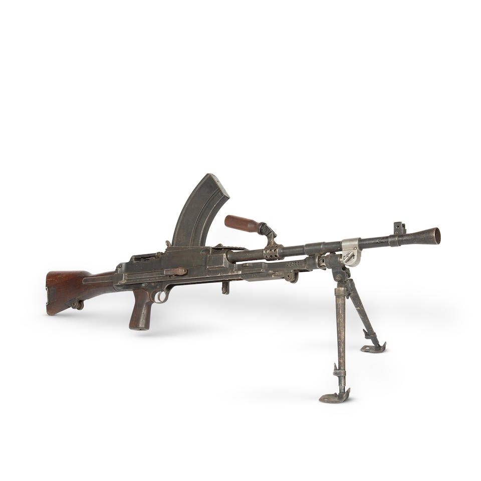 A deactivated .303 (British) 'Mk.3 Bren' light machine gun by Enfield, no. LB37575 With its deac...: A deactivated .303 (British) 'Mk.3 Bren' light machine gun by Enfield, no. LB37575 Of regulation pattern, fully-matching serial numbers, the receiver dated 1949, with folding offset ladder sight to th