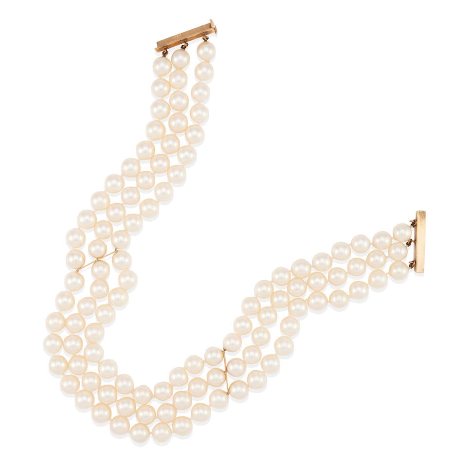 A 14K GOLD AND CULTURED PEARL THREE STRAND CHOKER: A 14K GOLD AND CULTURED PEARL THREE STRAND CHOKER • 14k yellow gold • 108 cultured pearls measuring approximately 7.90 x 7.50 mm • Length 12 in. • Estimated gross weight: 76.0 