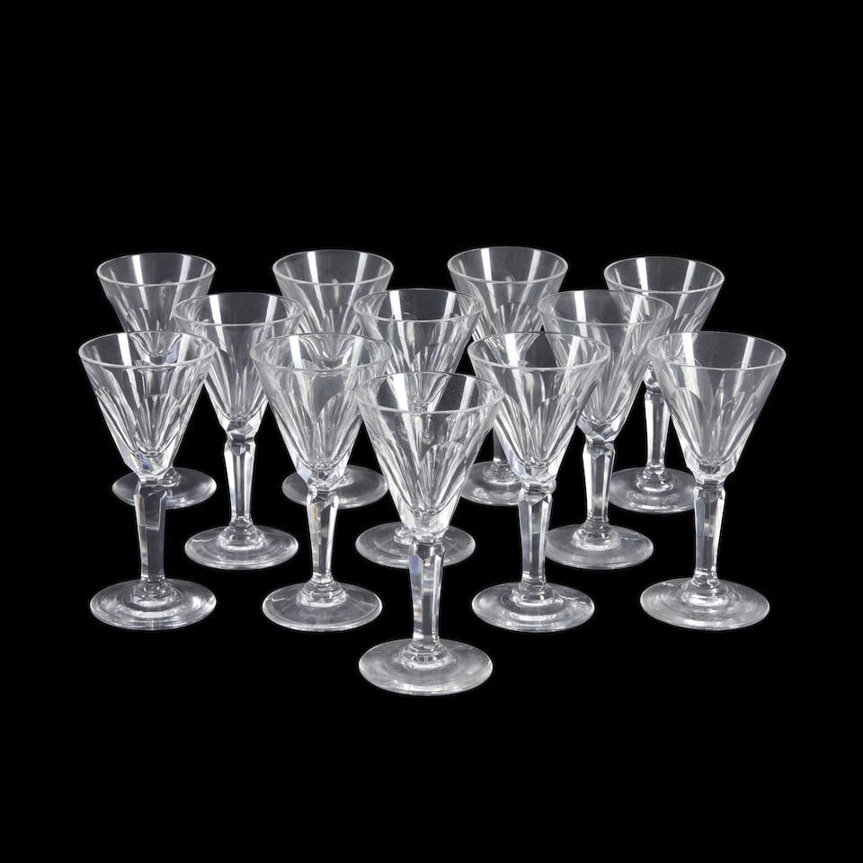 TWELVE WATERFORD COLORLESS CORDIAL GLASSES: TWELVE WATERFORD COLORLESS CORDIAL GLASSES • 20th century • Four pieces with acid stamp mark • 3 3/4' height • 2' diameter (mouth rim) Footnotes: OVERALL CONDITION: Very good. 