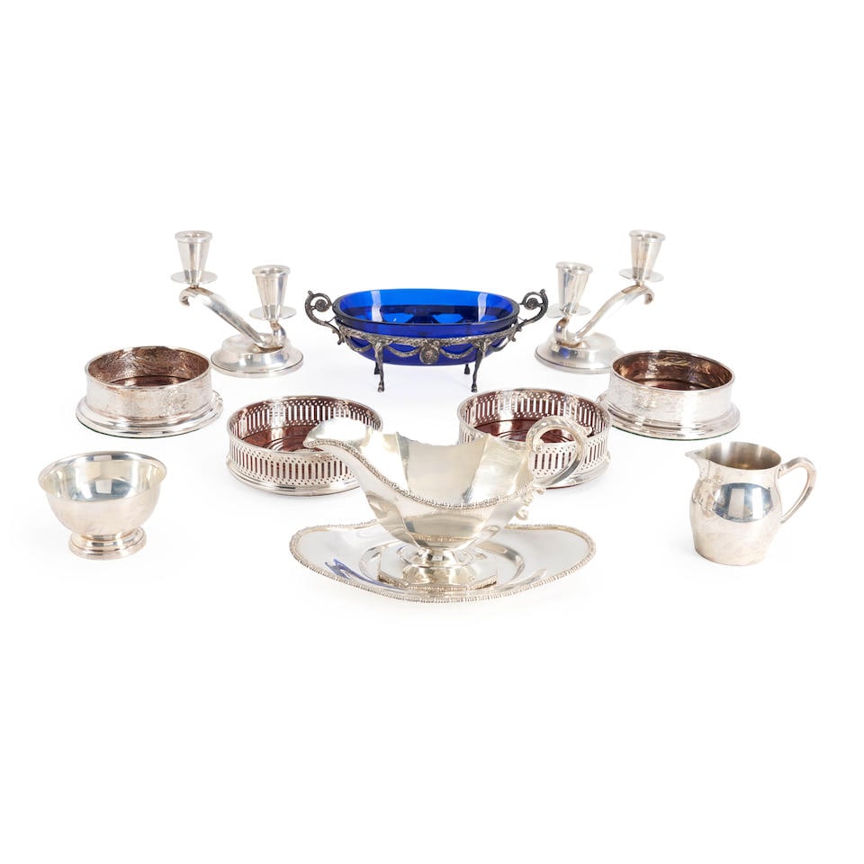 GROUP OF STERLING SILVER AND SILVER-PLATED TABLEWARE: GROUP OF STERLING SILVER AND SILVER-PLATED TABLEWARE • Sterling silver sauceboat and undertray, a small footed bowl, and a creamer • Pair of sterling silver weighted two-light candelabra &