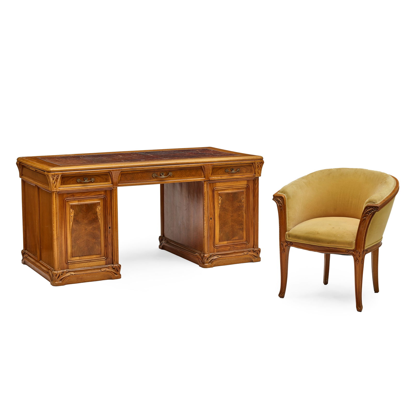 LOUIS MAJORELLE (1859-1926) Pedestal Desk and Chaircirca 1900carved walnut, leather, velvetheigh... (1 of 5)