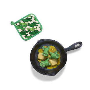 DAVID GILHOOLY (1943-2013) Frying Pan with Butter and Frogscirca 1990glazed ceramic together wit...: DAVID GILHOOLY (1943-2013) Frying Pan with Butter and Frogs circa 1990 glazed ceramic together with a frog patterned pot holder, incised 'David Gilhooly' on underside height 2 1/2in (6.3cm); length 16