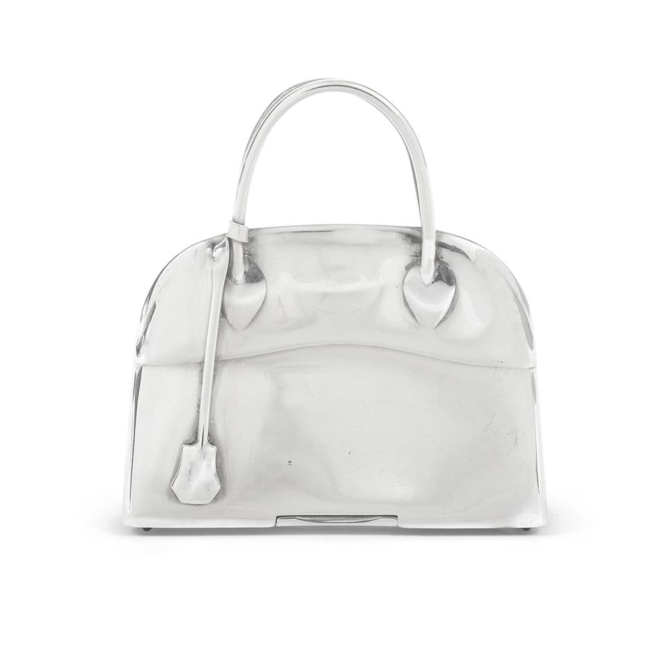 Hermès: a Sterling Silver Bolide Pill Box 1960s/70s: Hermès: a Sterling Silver Bolide Pill Box 1960s/70s Realistically modelled as a Bolide bag, stamped 925 Condition Grade B+ 4.5cm wide, 4.8cm high For further information on this lot please visit