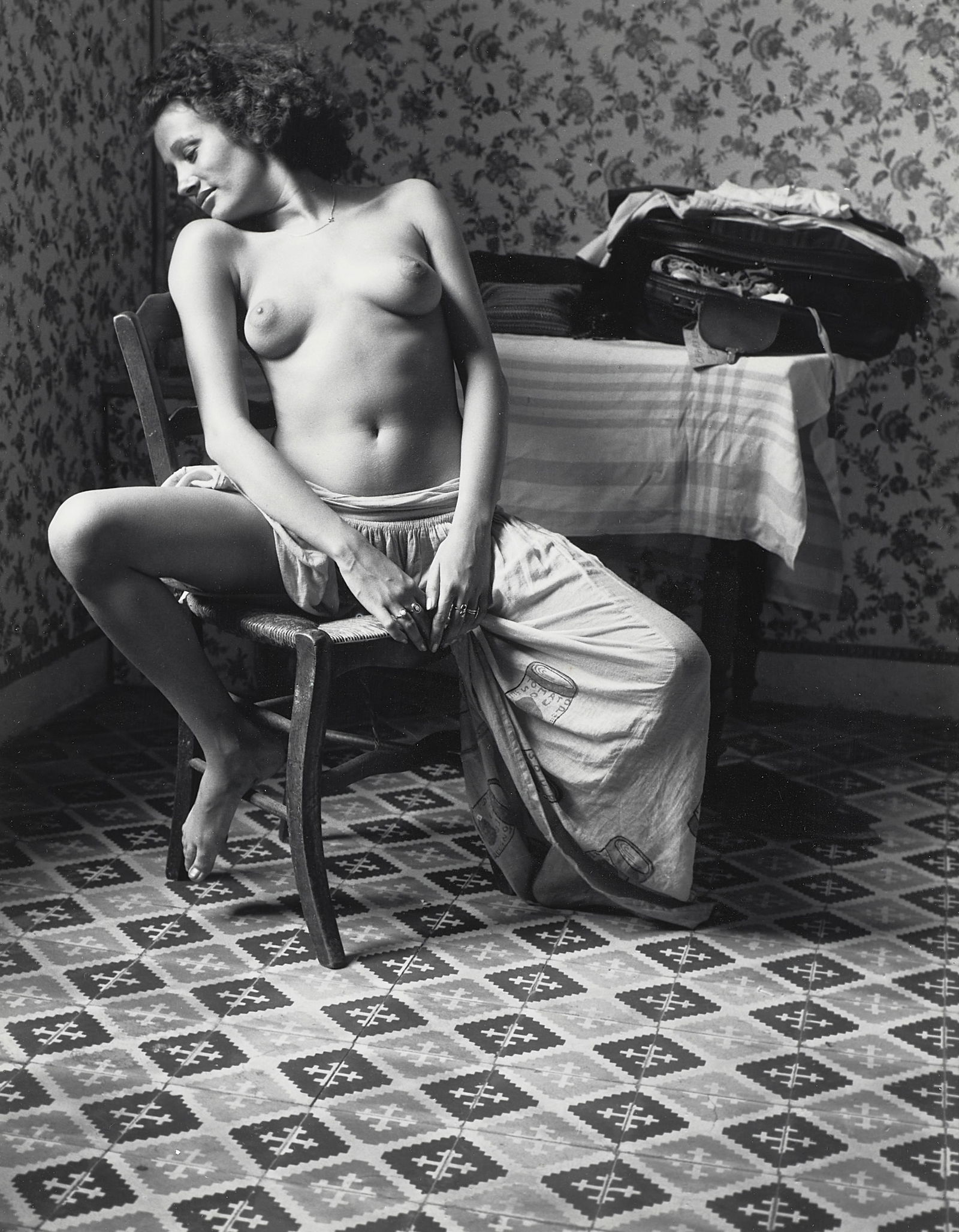 Jack Welpott (1923-2007); Sabine, Arles;: Jack Welpott (1923-2007) Sabine, Arles, 1973 Gelatin silver print, printed later; mounted, signed, dated, and numbered 'S. E. 64/100' in pencil on the mount, framed. 10 x 8 in. (25.4 x 20.3 cm.) Foot