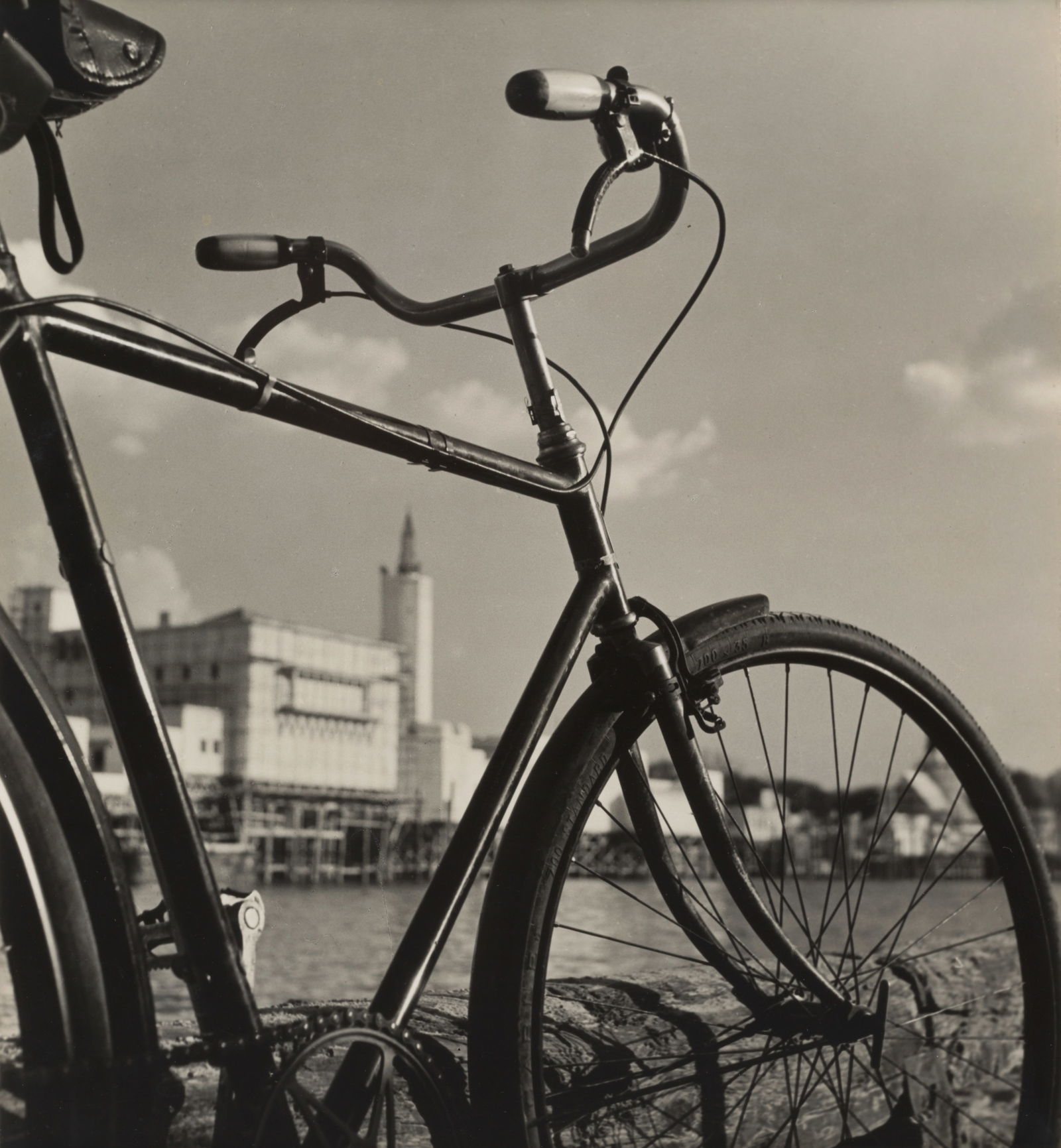 Herbert List (1903-1975); Bicycle;: Herbert List (1903-1975) Bicycle, c. 1935 Gelatin silver print; the photographer's Paris credit stamp on the reverse. 10 x 9 1/8 in. (25.4 x 23.2 cm.) sheet 10 1/8 x 9 1/4 in. (25.7 x 23.5 cm.) Footno