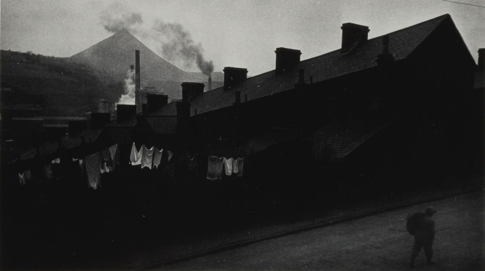 W. Eugene Smith (1918-1978); Welsh Row Houses;: W. Eugene Smith (1918-1978) Welsh Row Houses, 1950 Gelatin silver print, printed later; the photographer's estate stamp on the reverse. 4 3/4 x 8 3/8 in. (12.1 x 21.3 cm.) sheet 8 1/2 x 10 7/8 in. (21