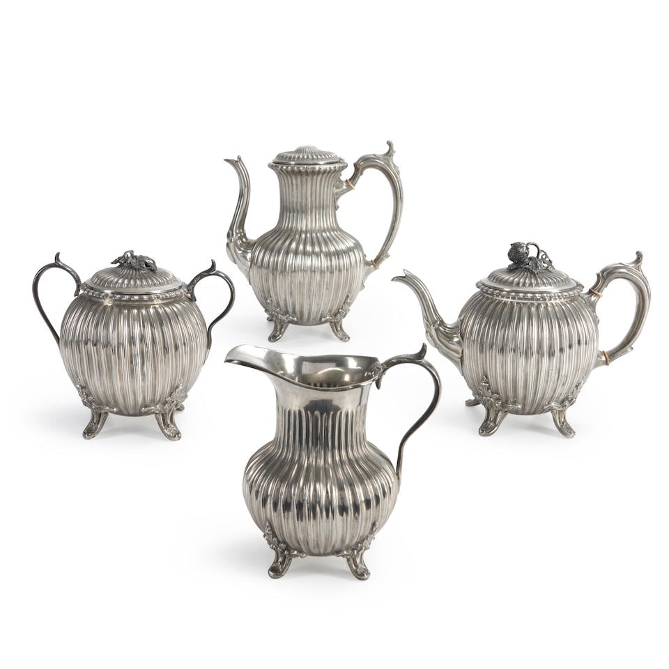 Four Britannia Tea Service Items, Shaw & Fisher (1830-94), Sheffield, England, c. 1890.: Four Britannia Tea Service Items, Shaw & Fisher (1830-94), Sheffield, England, c. 1890. All with ribbed and fluted walls, spurred scroll handles, and bulbous bases raised on cast acanthus and anthemio