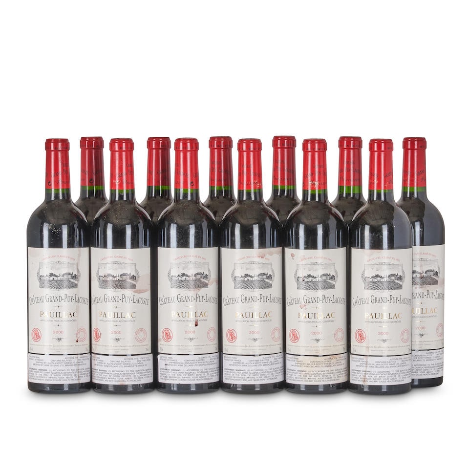 Chateau Grand Puy Lacoste 2000 (12 bottles): Chateau Grand Puy Lacoste 2000 Pauillac, 5eme Cru Classe u: into neck, some light wine stains 12 bottles Footnotes: Bordeaux, Left Bank This lot is subject to the following lot symbols: • •