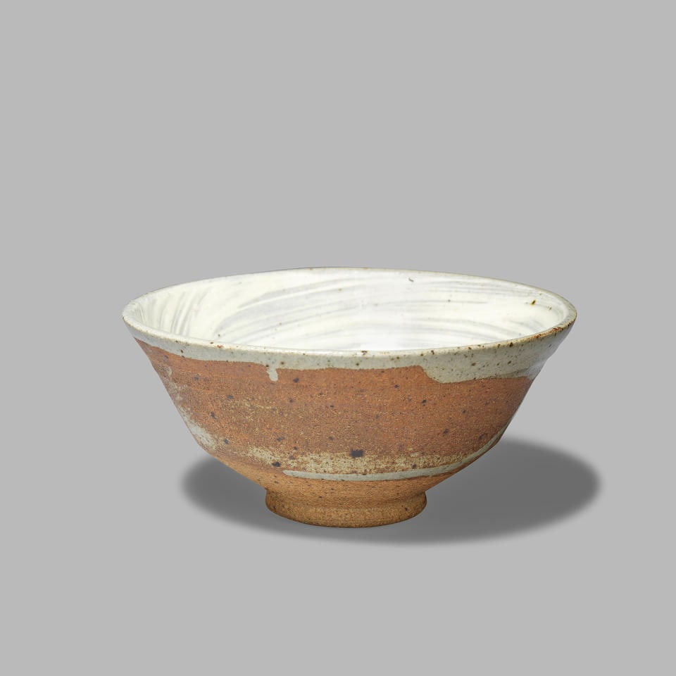Bernard Leach Small bowl: Bernard Leach Small bowl Stoneware, cream and grey brushed glazes with iron speckle to interior, extending to exterior rim and side. 6.6 cm high, 14 cm diameter Impressed with artist's and Leach Potte