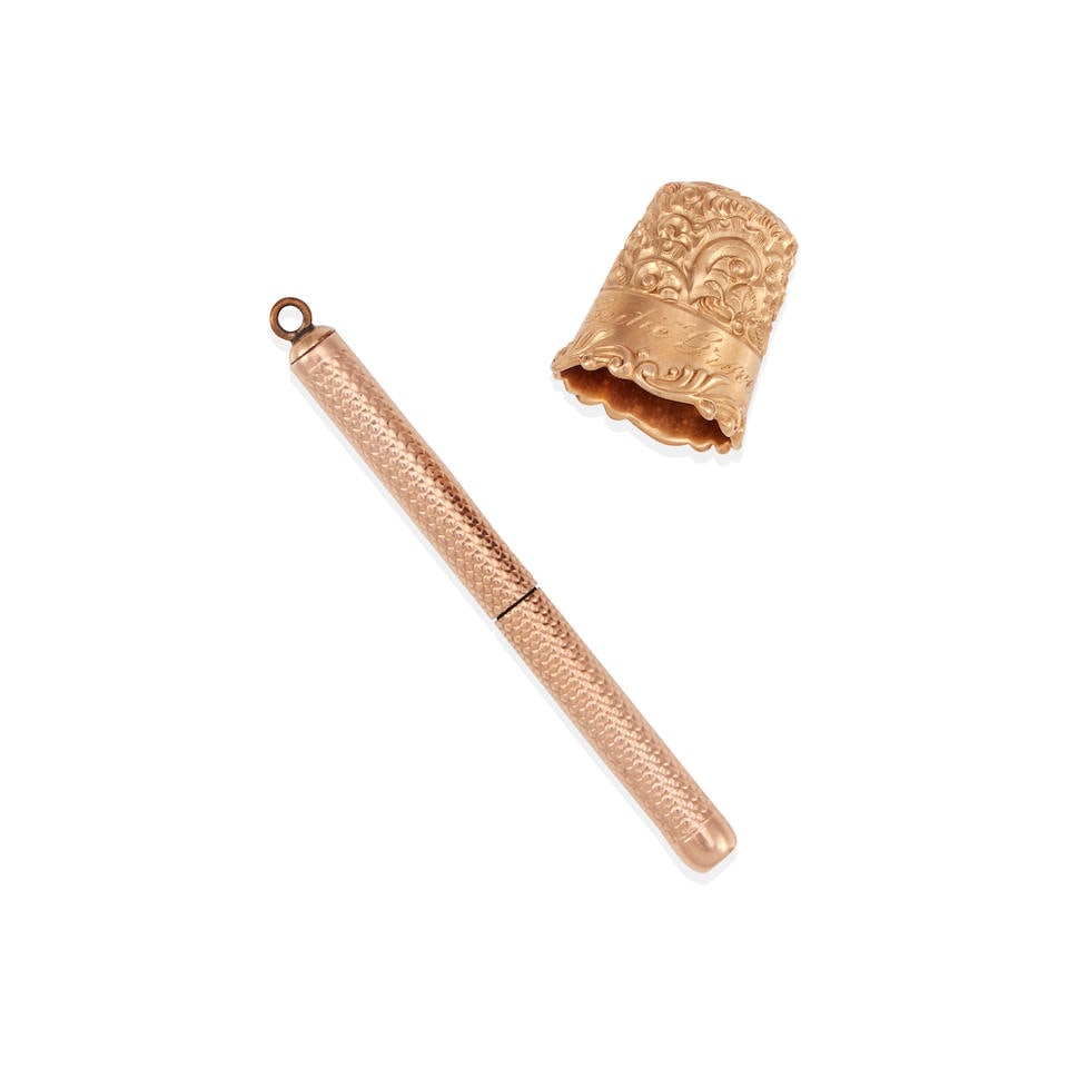 A ROSE GOLD THIMBLE AND RETRACTABLE TOOTHPICK (1 of 2)