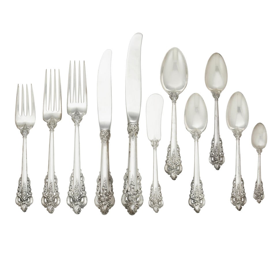 AN AMERICAN STERLING SILVER FLATWARE SERVICE FOR TWELVE by Wallace Silversmiths, Wallingford, 20...: AN AMERICAN STERLING SILVER FLATWARE SERVICE FOR TWELVE by Wallace Silversmiths, Wallingford, 20th century In the Grand Baroque pattern, comprising twelve dinner forks, twelve oval soup spoons, twelve