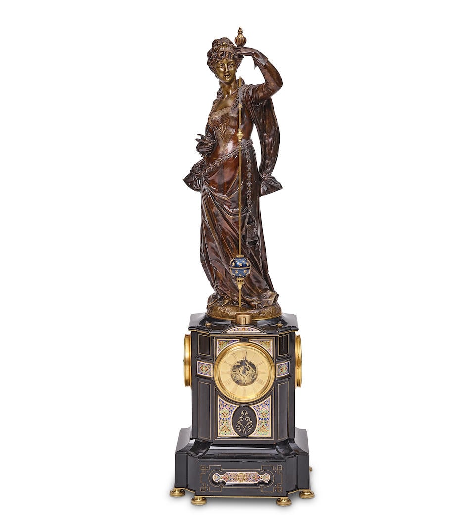 A NAPOLEON III PATINATED BRONZE, CHAMPLEVÉ ENAMEL, BLACK SLATE, AND BRASS CONICAL FIGURAL C... (1 of 3)