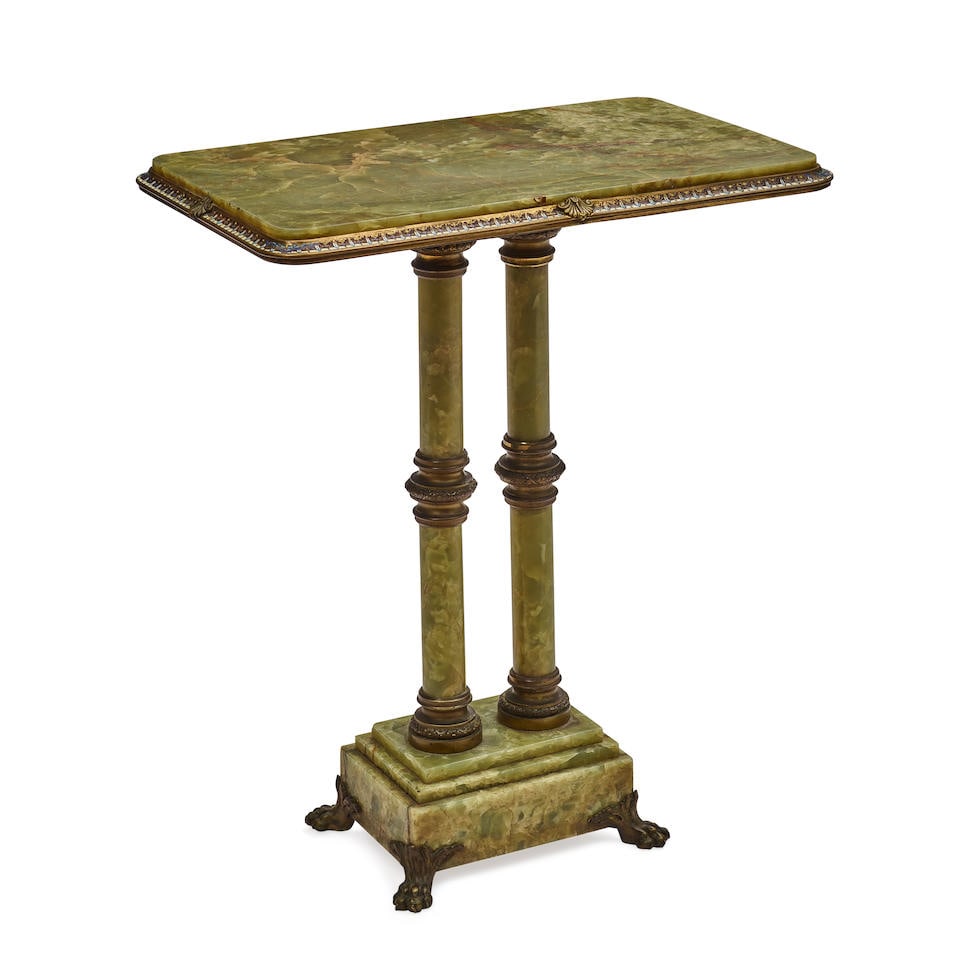 A FRENCH CHAMPLEVE ENAMEL AND ONYX GUERIDONEarly 20th century: A FRENCH CHAMPLEVE ENAMEL AND ONYX GUERIDON Early 20th century height 30in (76cm); width 25 1/2in (65cm); depth 15 1/2in (39.5cm) For further information on this lot please visit Bonhams.com For furth