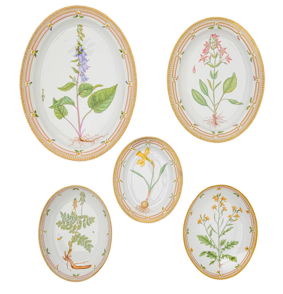 FIVE ROYAL COPENHAGEN PORCELAIN FLORA DANICA SERVING PIECESDenmark, 20th century: FIVE ROYAL COPENHAGEN PORCELAIN FLORA DANICA SERVING PIECES Denmark, 20th century Comprising two oval bowls and three-graduated oval serving platters, each with blue wave mark, various painted titles,