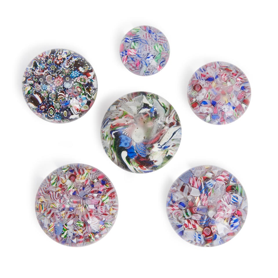 SIX END-OF-DAY MILLEFIORI SCRAMBLE GLASS PAPERWEIGHTS, France, ht. 1 1/2 to 2 1/4 in.: SIX END-OF-DAY MILLEFIORI SCRAMBLE GLASS PAPERWEIGHTS, France, ht. 1 1/2 to 2 1/4 in. For further information on this lot please visit Bonhams.com For further information about this lot please