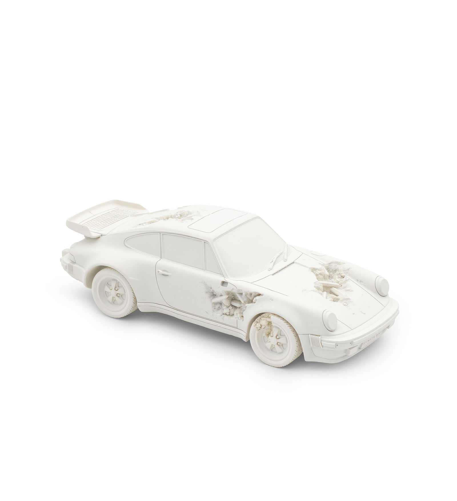 Daniel Arsham Eroded 911 Turbo Porsche, 2020 numbered out of 500 on the holographic label on the...: Daniel Arsham (American, born 1980) Eroded 911 Turbo (Porsche) Cast multiple in selenite with quartz crystals, 2020, numbered 106/500 on the holographic label affixed to the box, produced and distribu