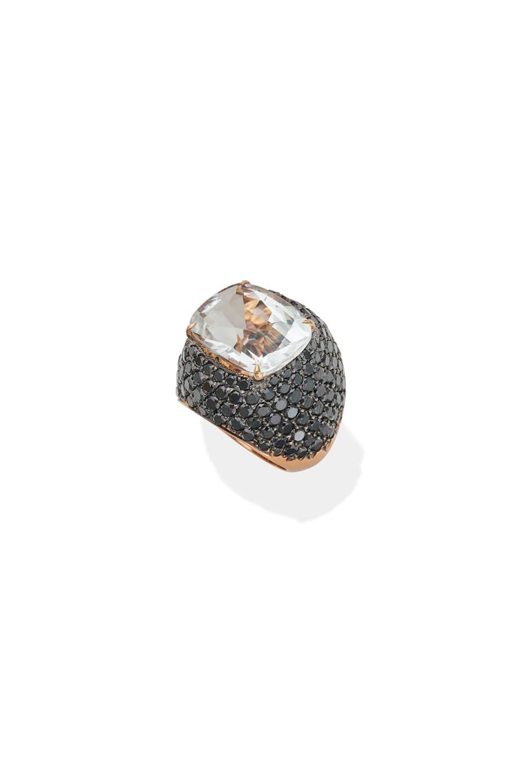 PAOLO COSTAGLI | TOPAZ AND DIAMOND RING: PAOLO COSTAGLI | TOPAZ AND DIAMOND RING Of bombé design set with a cushion shaped white topaz, with estimated weight 9.30 carats, the mount accented with round brilliant-cut black diamonds, esti