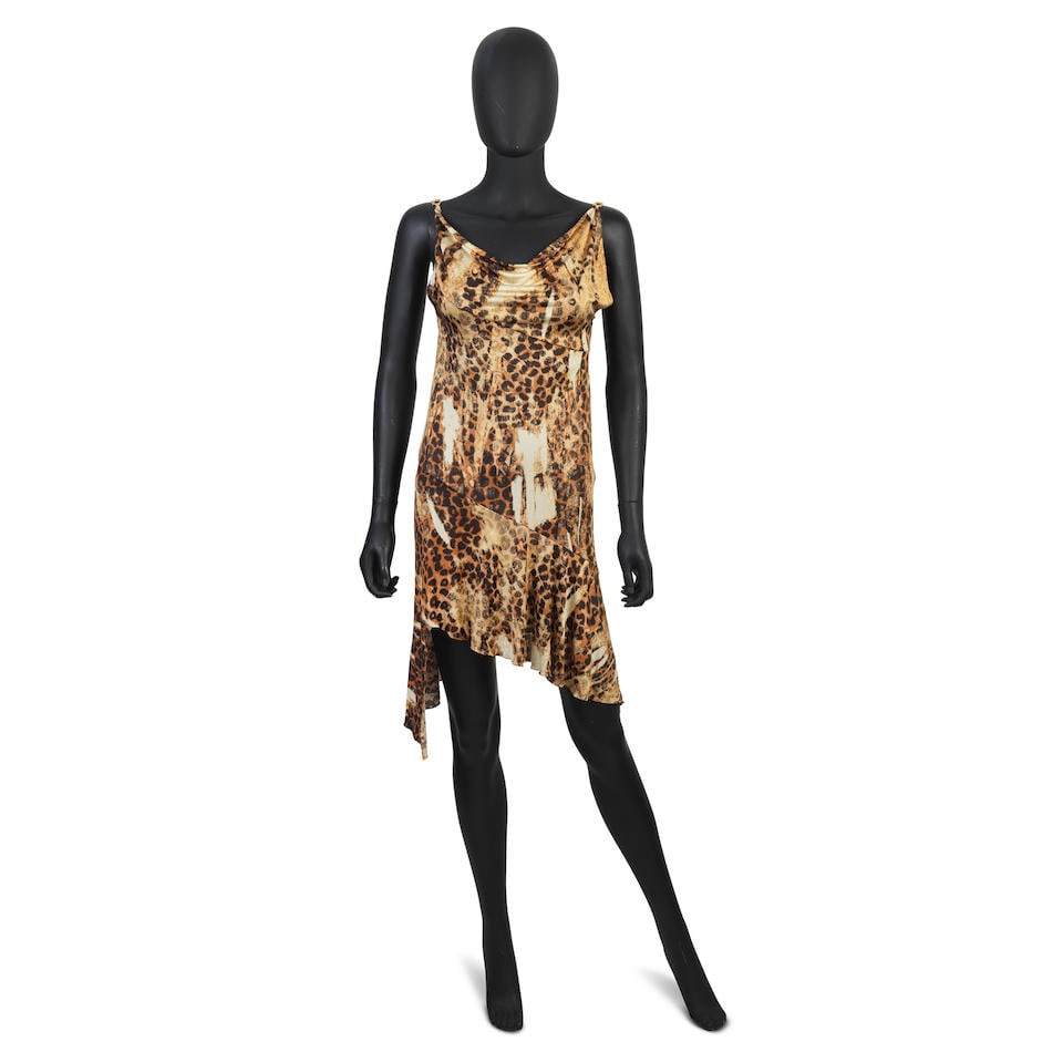 John Galliano for Christian Dior: a Leopard Print Silk Slip Dress Autumn/Winter 2000: John Galliano for Christian Dior: a Leopard Print Silk Slip Dress Autumn/Winter 2000 Printed jersey silk with spaghetti straps with gold metal CD charms Condition Grade A- Labelled size 40 Footnotes: