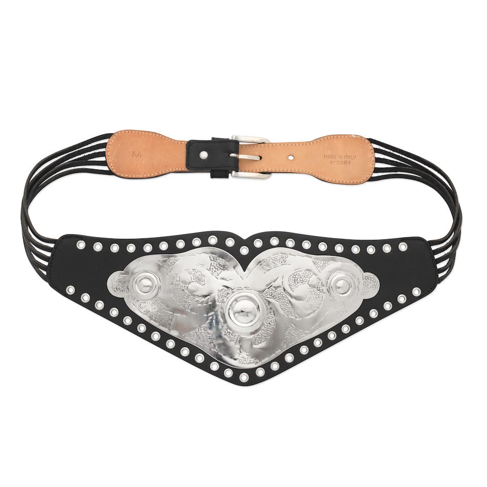 John Galliano for Christian Dior: a Championship Belt Autumn 2001: John Galliano for Christian Dior: a Championship Belt Autumn 2001 Smooth black leather with hammered silver metal plate design Condition Grade B Labelled size M, 13cm at widest point For further infor