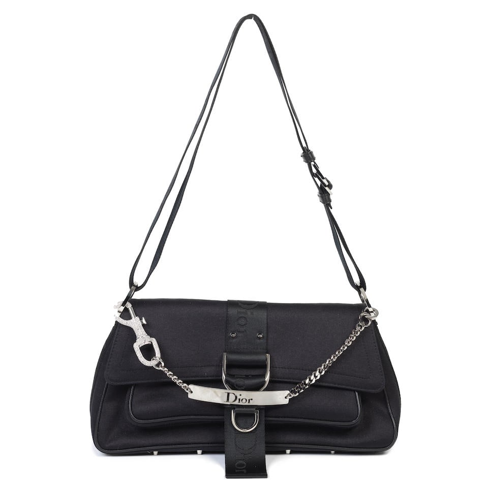 John Galliano for Christian Dior: a Black Fabric Hardcore Shoulder Bag 2003 (includes dust bag): John Galliano for Christian Dior: a Black Fabric Hardcore Shoulder Bag 2003 Black fabric body with nylon shoulder strap, silver hardware with crystal studded clip detail Condition Grade B+ 31cm wide,