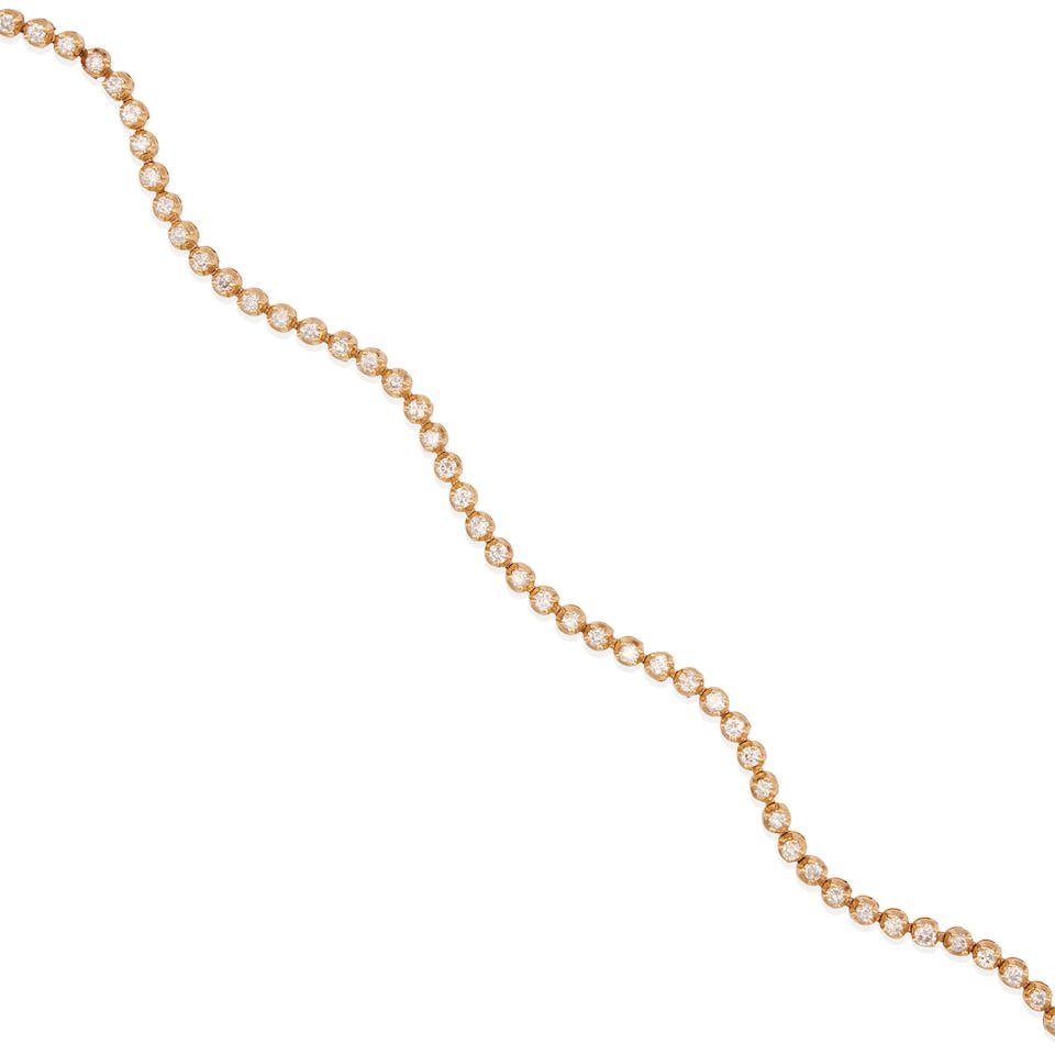 A 14K GOLD AND DIAMOND BRACELET (1 of 3)