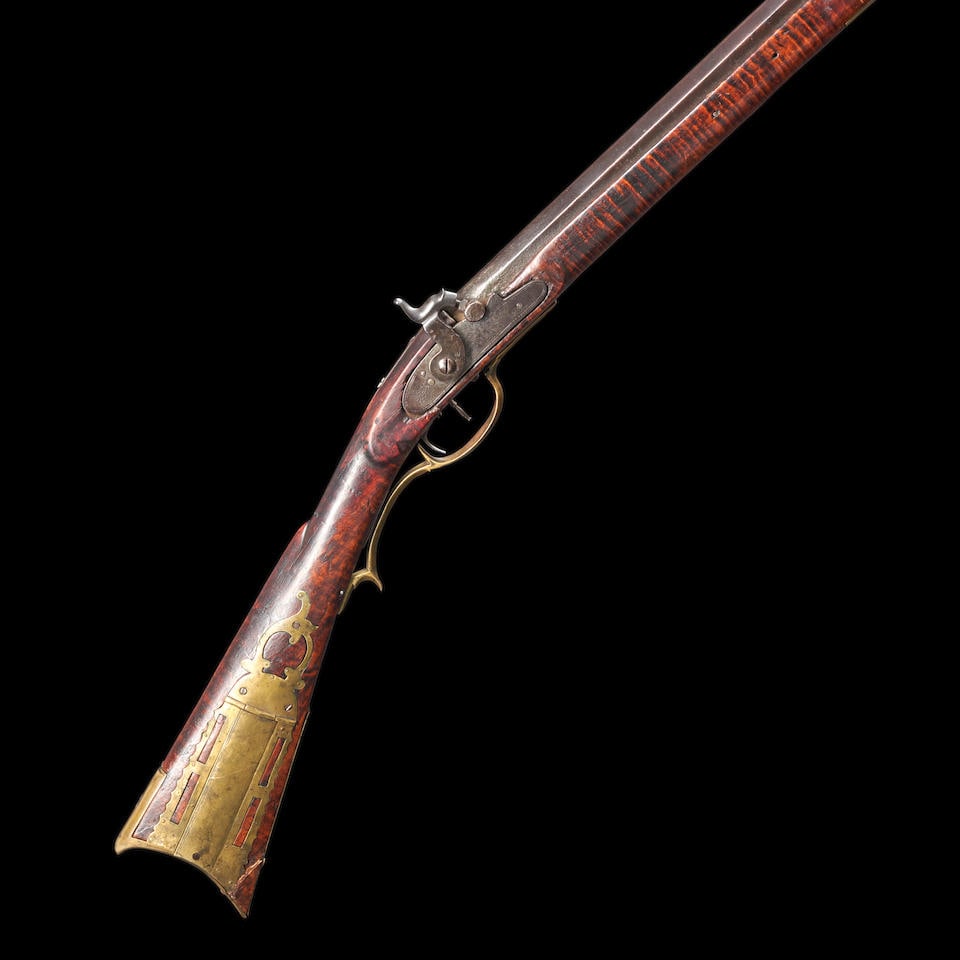American Percussion Long Rifle,: American Percussion Long Rifle, second quarter of the 19th century. 40 1/4 in., .45 caliber rifled bore, octagonal barrel; flat foliate engraved lock marked 'JOH GOLCHER' with set trigger; tiger maple