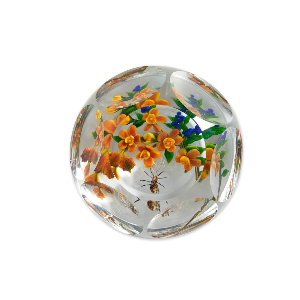 DELMO TARSITANO (1921-1990) FACETED PAPERWEIGHT WITH FLOWERS AND SPIDER IN HER WEB, Massachusett...: DELMO TARSITANO (1921-1990) FACETED PAPERWEIGHT WITH FLOWERS AND SPIDER IN HER WEB, Massachusetts, late 20th century, signed in cane initials 'DT,' ht. 2 1/4, dia. 3 7/8 in. Footnotes: Provenance The