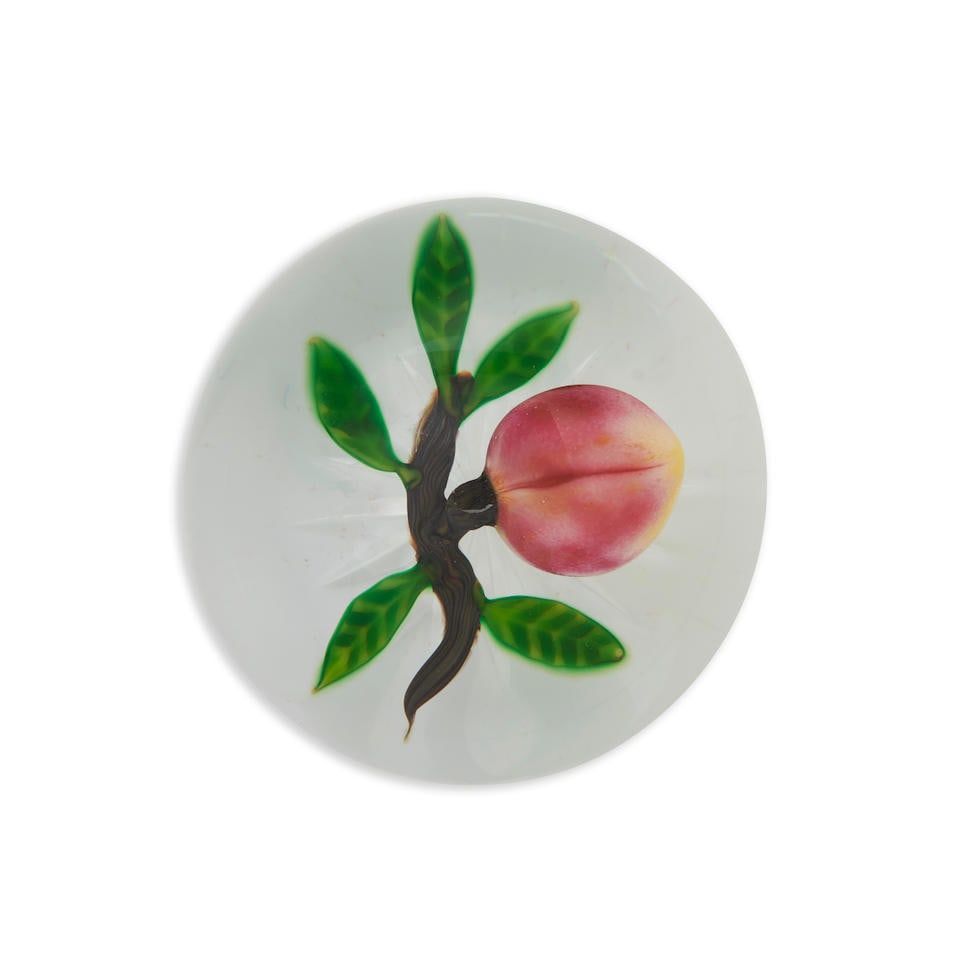 DELMO TARSITANO (1921-1990) PAPERWEIGHT WITH PEACH, Massachusetts, late 20th century, signed in ...: DELMO TARSITANO (1921-1990) PAPERWEIGHT WITH PEACH, Massachusetts, late 20th century, signed in cane initials 'DT,' ht. 2 1/2, dia. 3 in. Footnotes: Provenance The Joan and Rif Freedman Collection, Ma