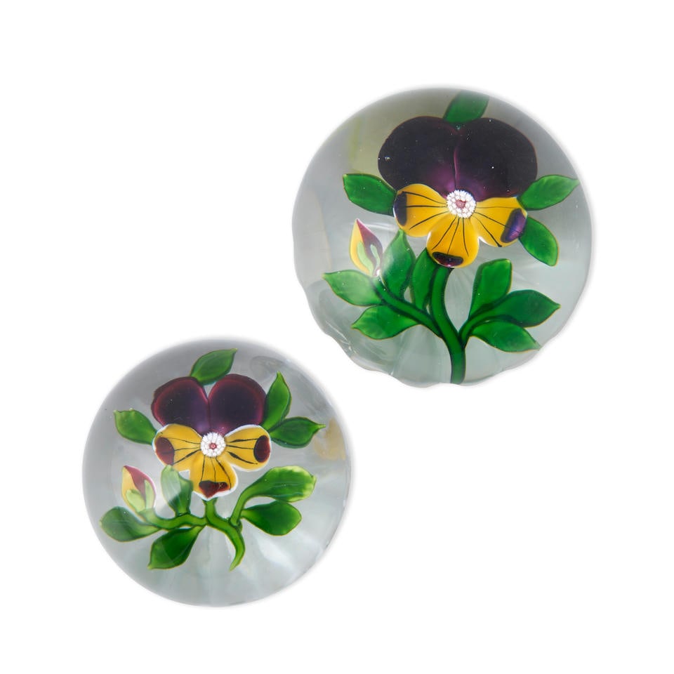 TWO ANTIQUE BACCARAT PANSY PAPERWEIGHTS, France, c. 1850, both unsigned, with star cane centers ... (1 of 2)