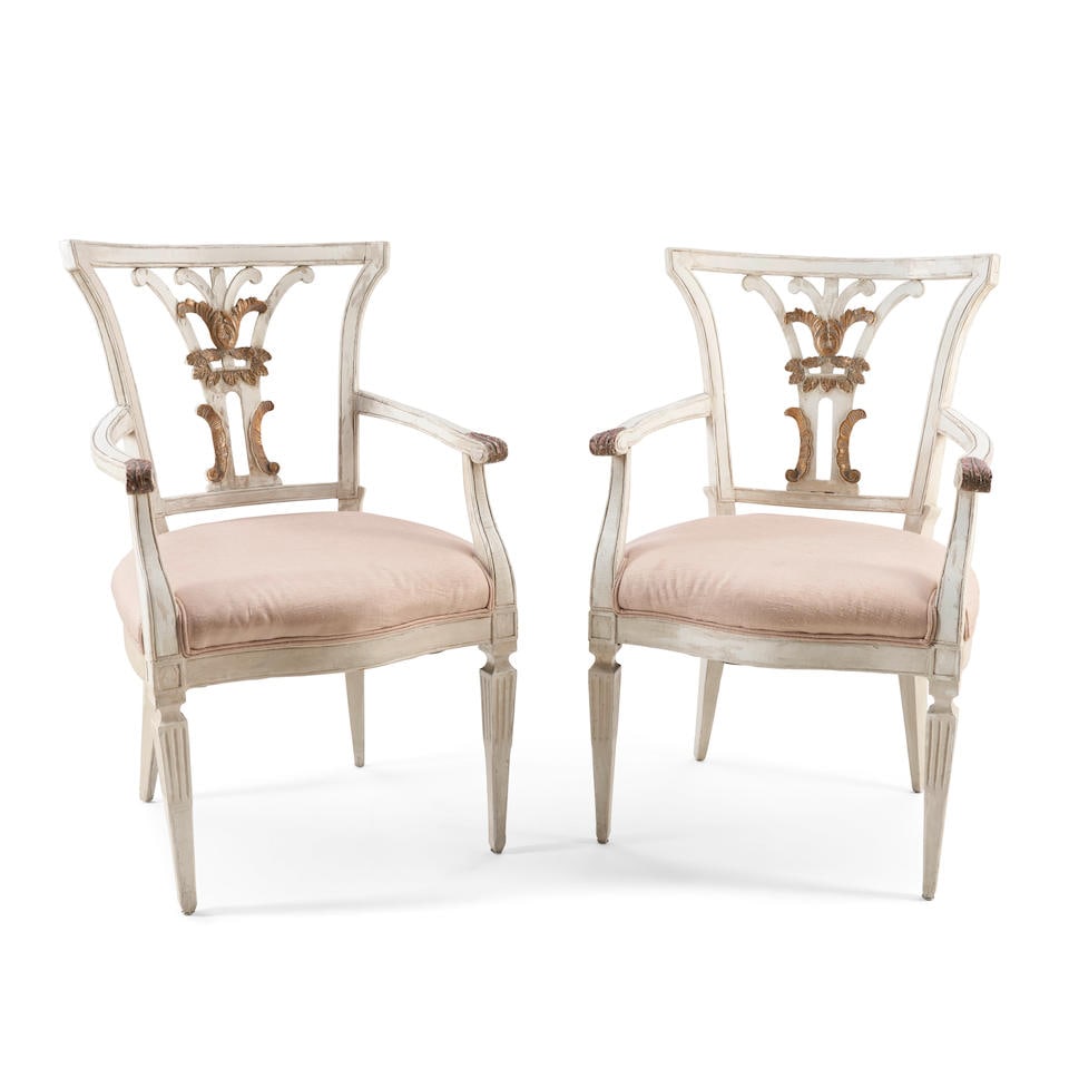Ten Gustavian-style Painted Dining Chairs,: Ten Gustavian-style Painted Dining Chairs, the six armchairs with curved tablet back centered by an x-form splat with carved medallion, the bowed seat raised on saber legs, ht. 34, wd. 19, dp. 21, sea