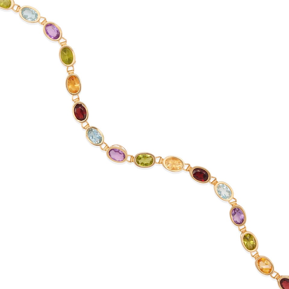 A 14K GOLD AND GEM-SET BRACELET (1 of 3)