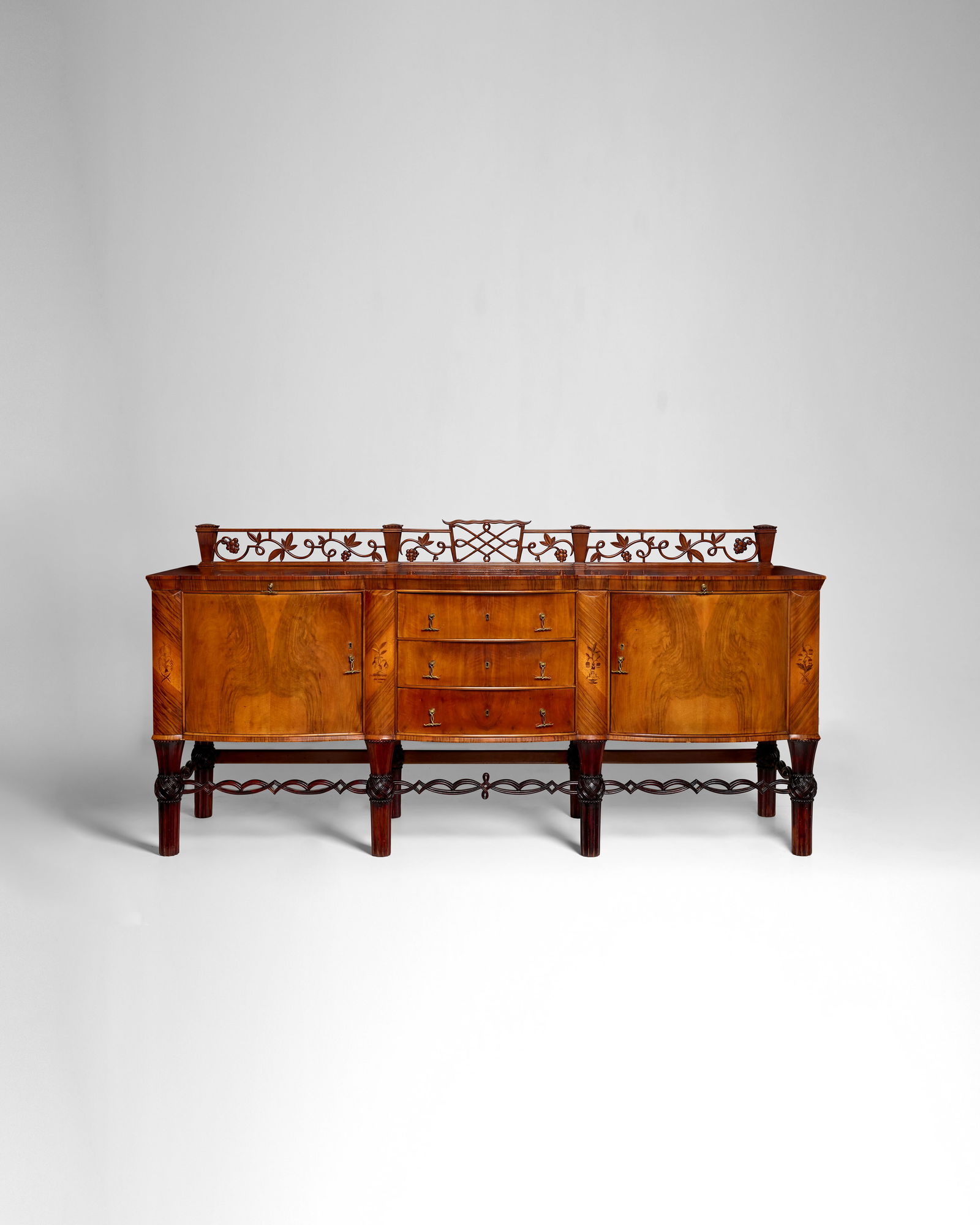 OTTO PRUTSCHER (1880-1949) Sideboard1924for Anton Popischil, solid, veneered, and inlaid walnut,...: OTTO PRUTSCHER (1880-1949) Sideboard 1924 for Anton Popischil, solid, veneered, and inlaid walnut, brass pulls, metal manufacturer's label affixed to inside door height 37 1/2in (95cm); width 88 3/4in