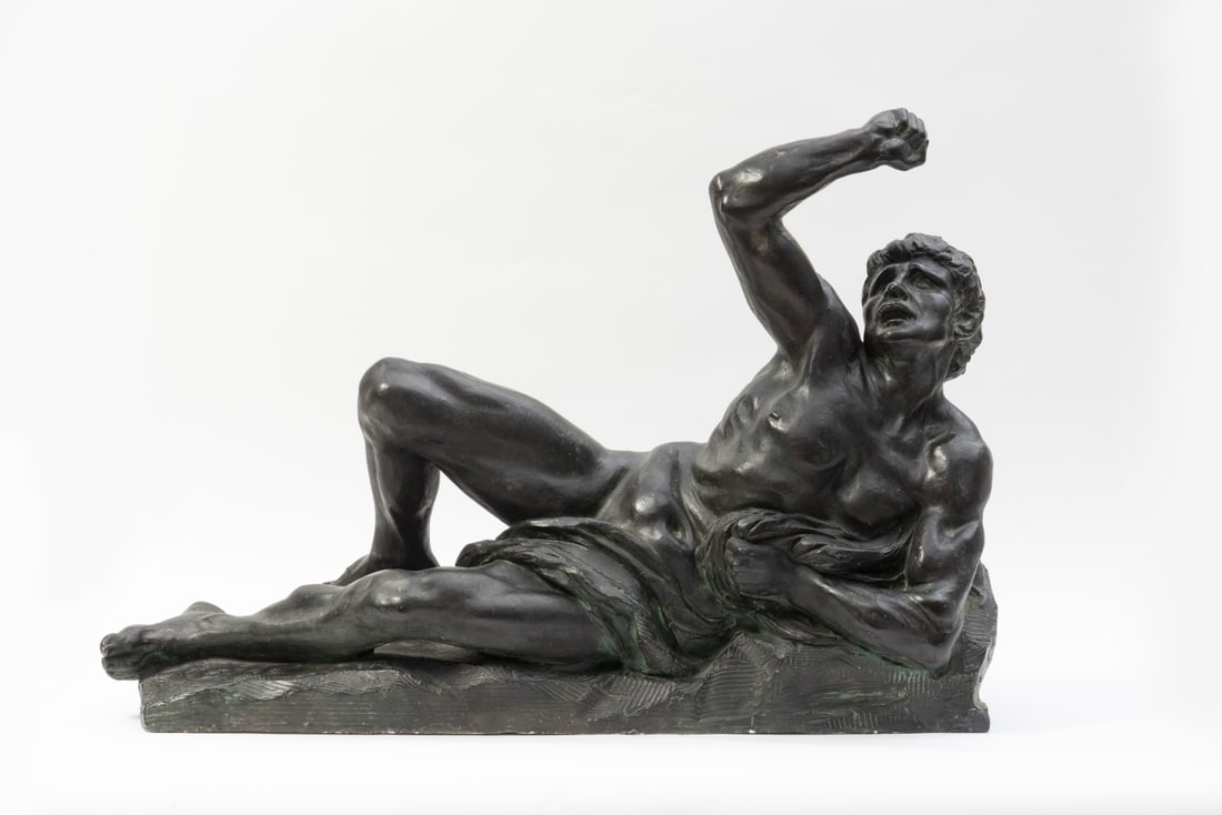 Jef Lambeaux (1852-1908) Man lying down: Jef Lambeaux (1852-1908) Man lying down Signé Plâtre à patine noire Getekend Gips met zwart patina Signed Plaster with black patina 67 x 98 x 34 cm (38 1/2 in wide, 13 in deep