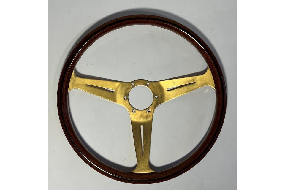 A Nardi 14.5 inch wood-rimmed steering wheel 16 inches in diameter, 1 inch in height (1 of 2)