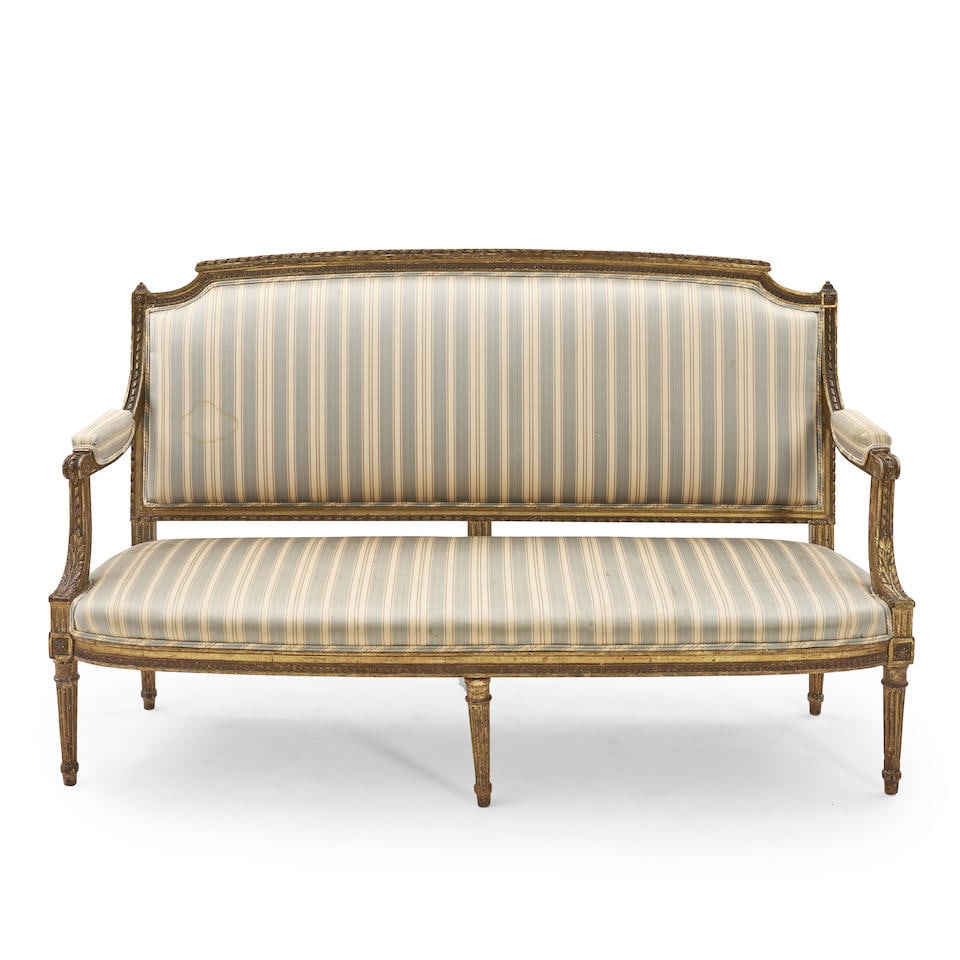 LOUIS XVI-STYLE CANAPE: LOUIS XVI-STYLE CANAPE France, 19th century, carved giltwood with striped upholstery to back, seat and arms, lg. 60, back ht. 38 1/2, seat approx. ht. 16 in. For further information on this lot please